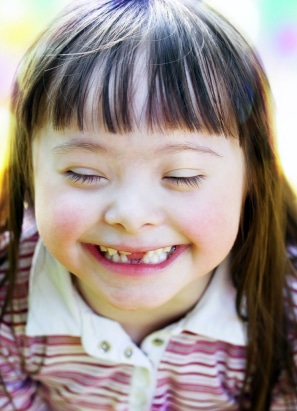 Person with special needs smiling.